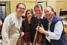 Members of the award-winning Euclid Quartet pose with their instruments.